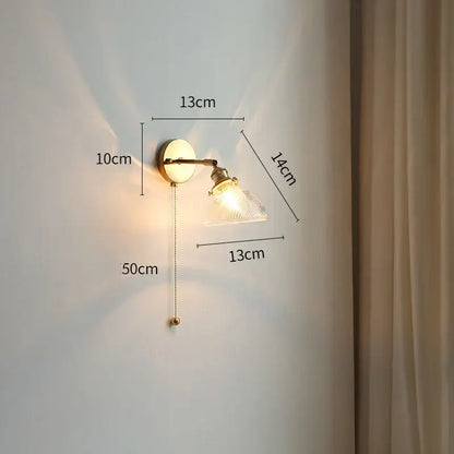 Vintage brass wall light with clear textured glass shade and adjustable arm for modern green glass led wall lighting