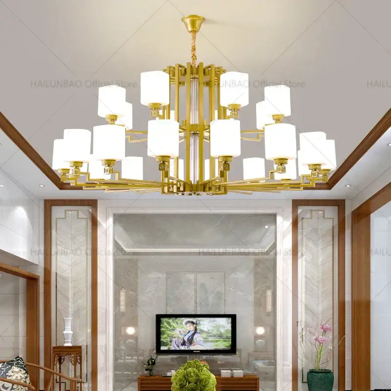 Modern chinese style chandelier bronze pendant light with gold-toned frame and multiple white cylindrical shades for living room