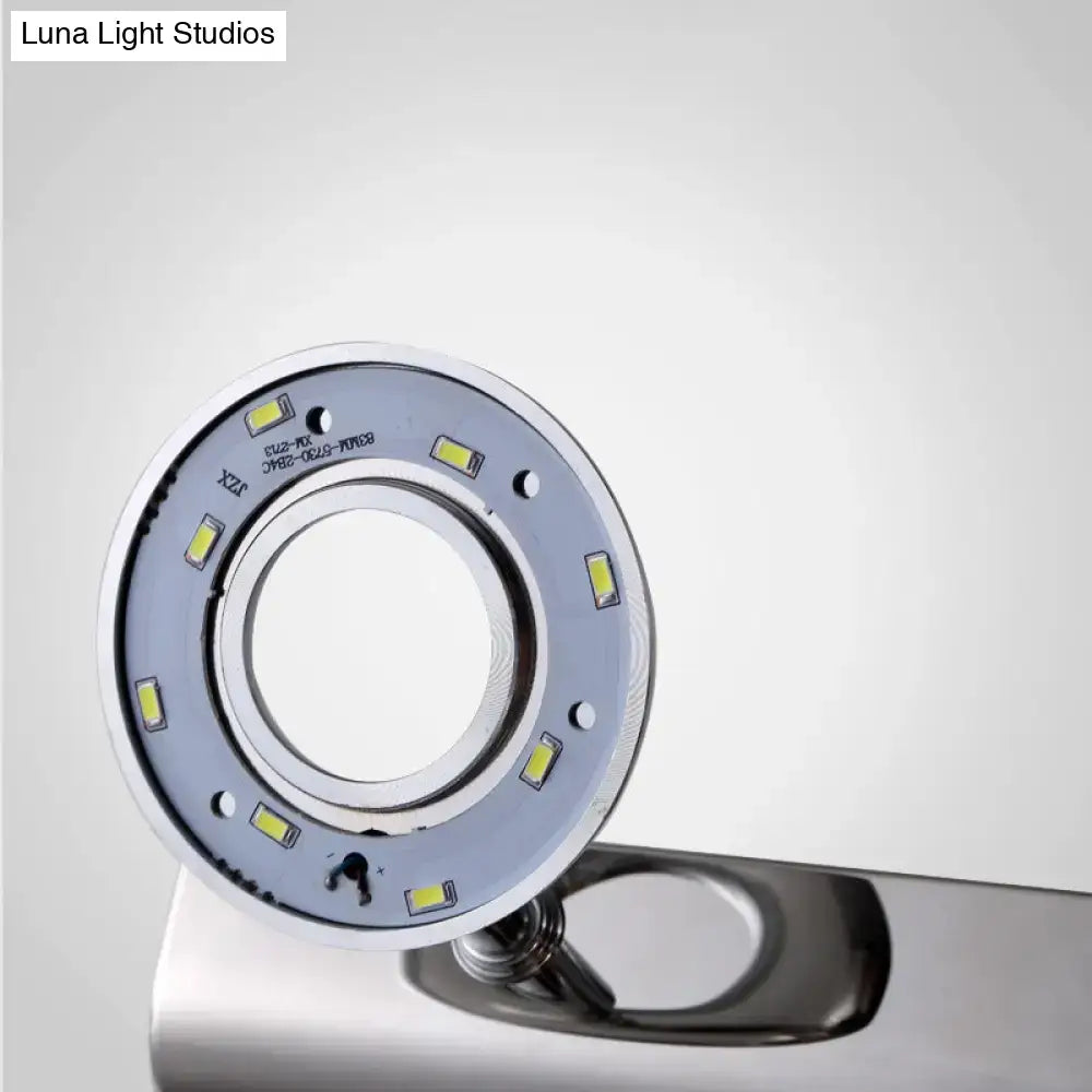 Modern chrome 2 3 head bathroom wall lighting fixture with a circular metallic silver led ring light and yellowish green leds
