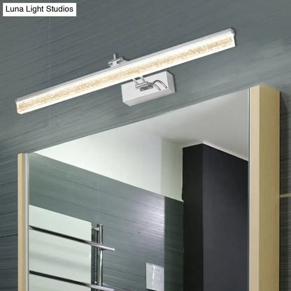 Modern chrome adjustable led vanity light with sleek rectangular design and embedded warm white leds for bathroom mirrors