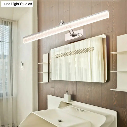 Modern chrome led vanity light with adjustable spotlight and sleek rectangular design for bathroom mirrors