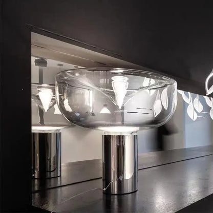 Modern chrome aella glass table lamp with clear bowl-shaped glass and sleek chrome base for bedroom decorbites aella glass decor