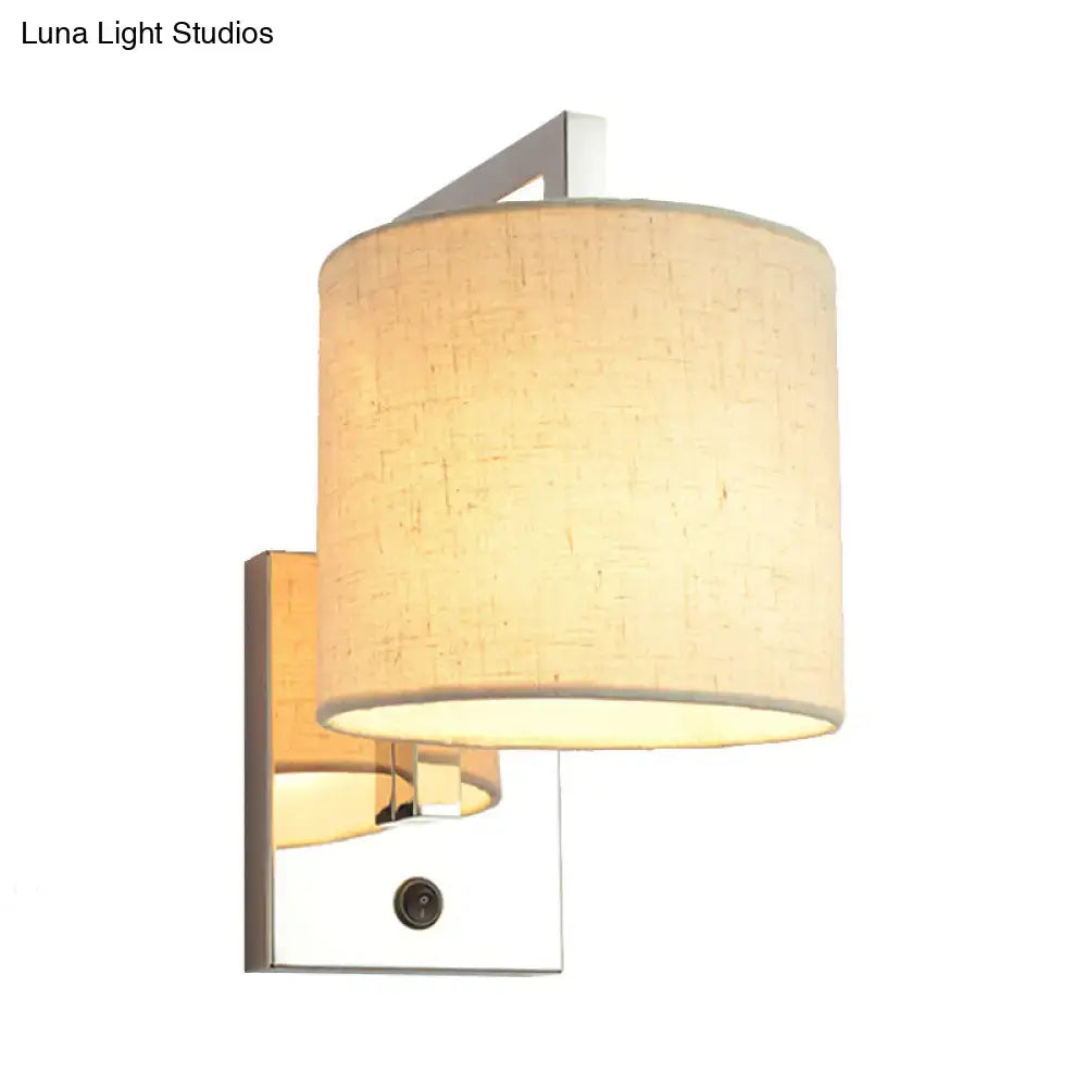 Modern chrome and beige fabric led wall sconce with cylindrical shade for living room lighting