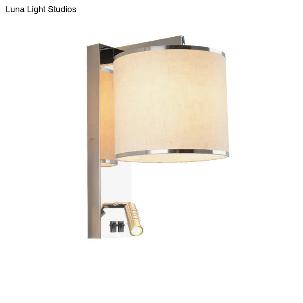 Modern chrome and beige fabric led wall sconce with cylindrical shade and integrated reading light for living room use
