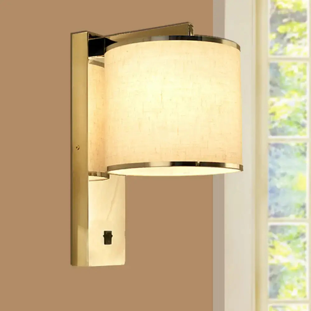 Modern chrome and beige fabric led wall sconce with gold-toned metal trim for living room lighting