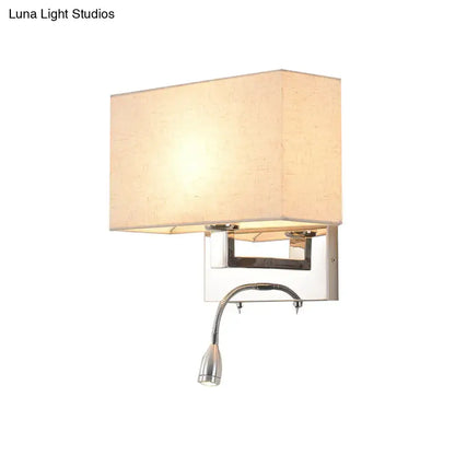 Modern wall light with chrome frame and beige fabric shade 12 inches high and 8 inches shade width for bedroom use