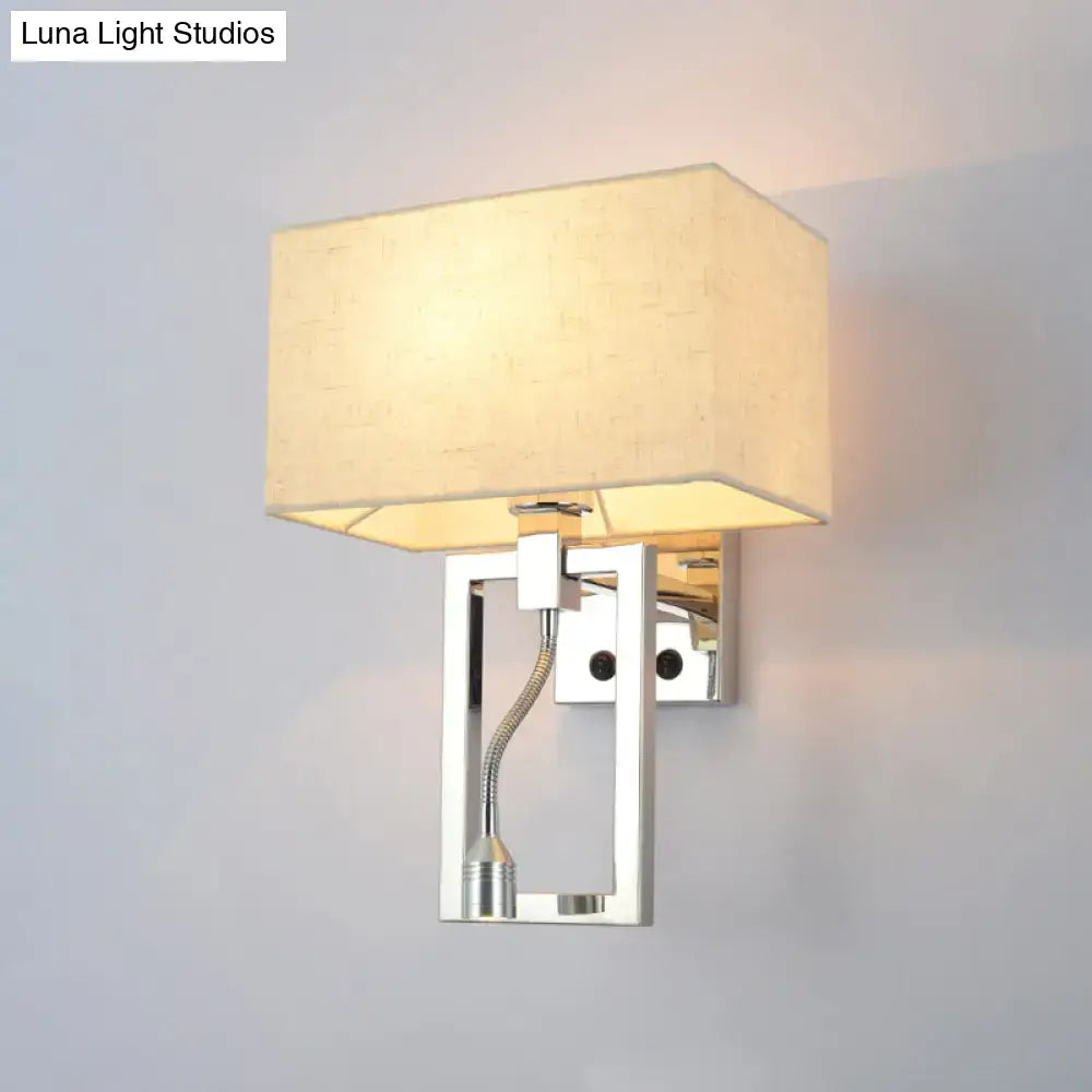 Modern chrome and beige wall mount light sconce with rectangular fabric shade and adjustable gooseneck spotlight for bedroom