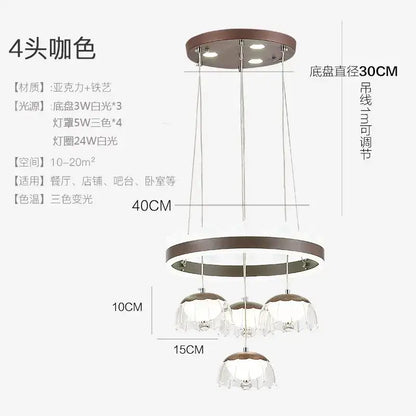 Modern led dining table chandelier with bronze circular base and clear petal-shaped glass shades for dining table lighting
