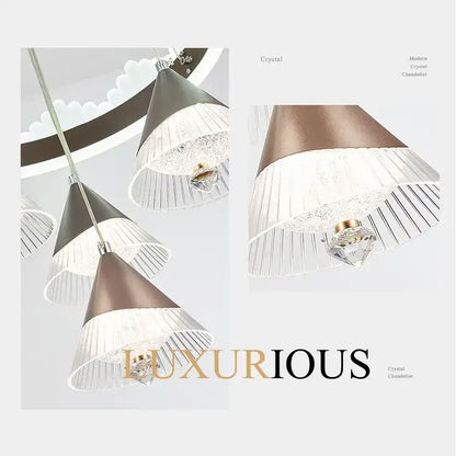 Modern chrome and black led dining table chandelier with a conical bronze and clear glass shades featuring pleated detailing