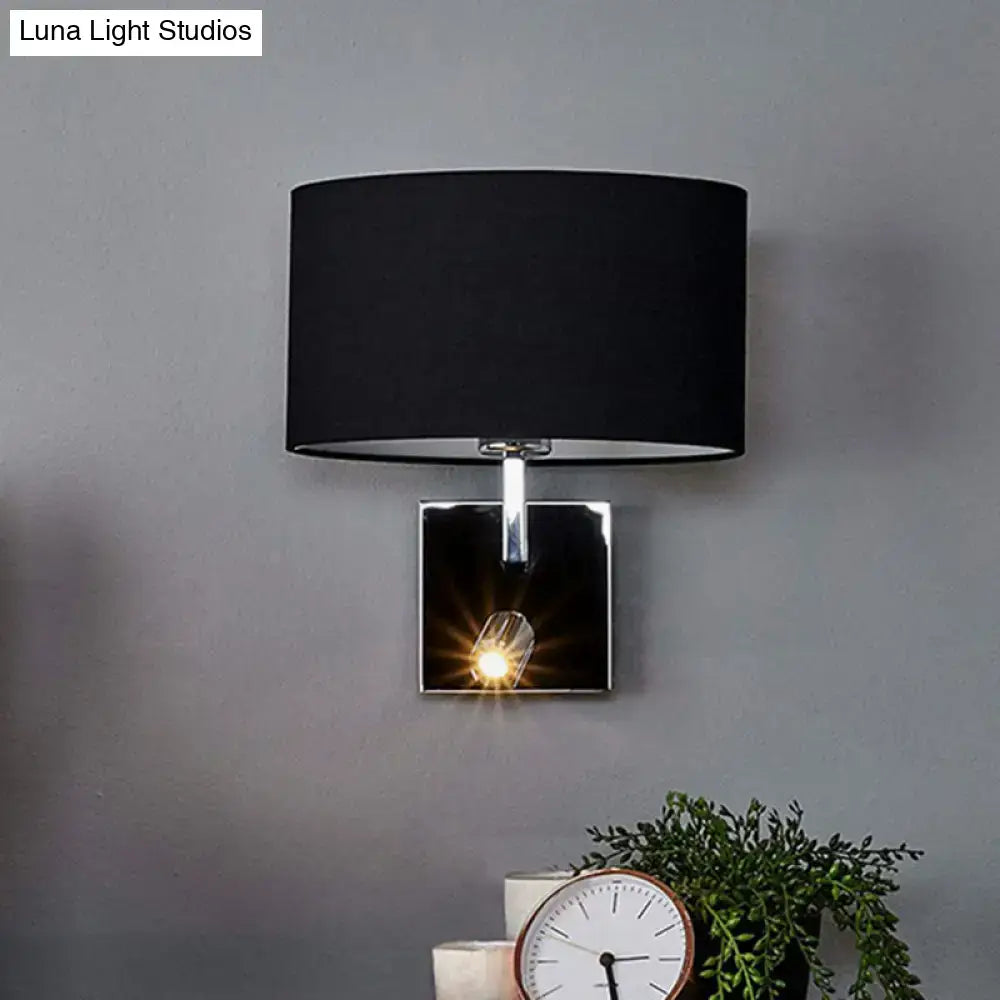 Modern chrome and brown fabric wall sconce with black drum lampshade metal fixture and adjustable spotlight for bedroom