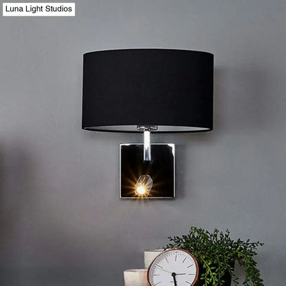 Modern chrome and brown fabric wall sconce with black drum lampshade metal fixture and adjustable spotlight for bedroom