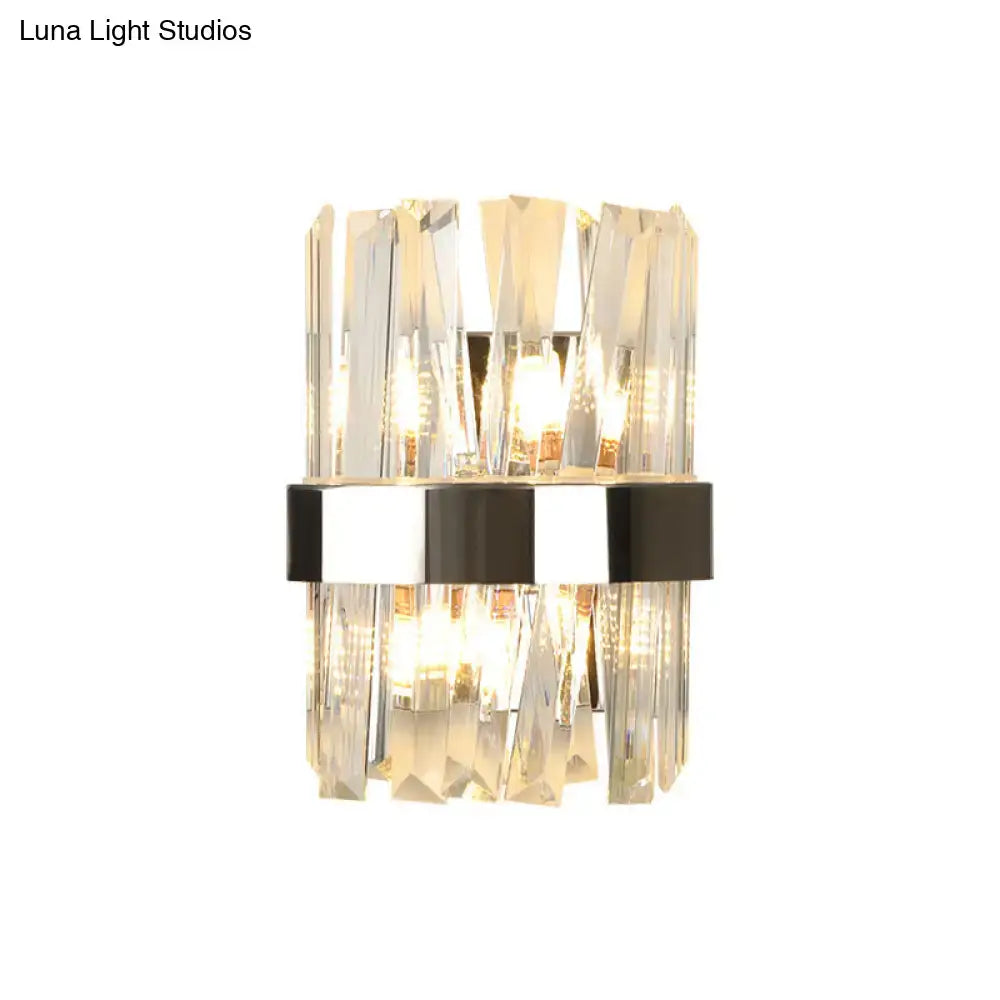 Modern chrome and clear crystal wall lamp with faceted glass rods and black silver metallic band for bedroom use