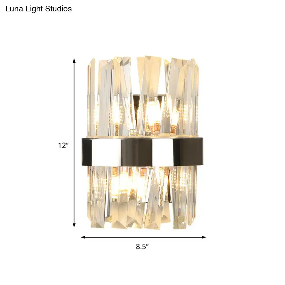 Modern chrome and clear crystal wall lamp with vertical faceted glass rods and black and silver metallic band