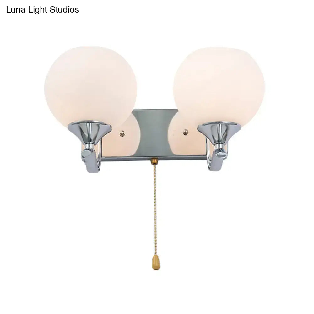 Modern chrome and cream glass wall light with two frosted globes and pull chain for 220v-240v 110v-120v use