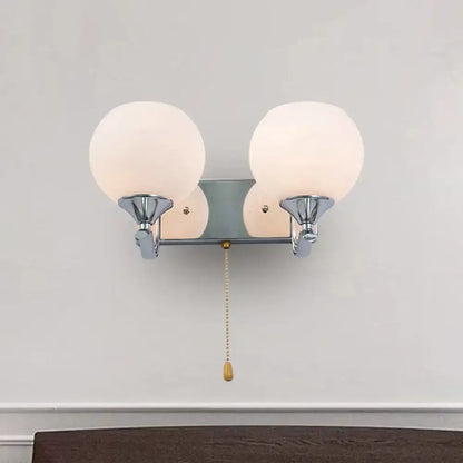 Modern chrome wall light bedroom sconce with two cream frosted glass globes and brass pull chain 220v-240v 110v-120v