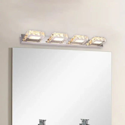 Modern chrome and gold crystal vanity sconce with four lights and crystal vanity accents in sleek stainless steel finish