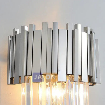 Modern chrome and gold decorbites crystal clear led wall sconce with vertical bars and hanging crystal prisms for bedroom