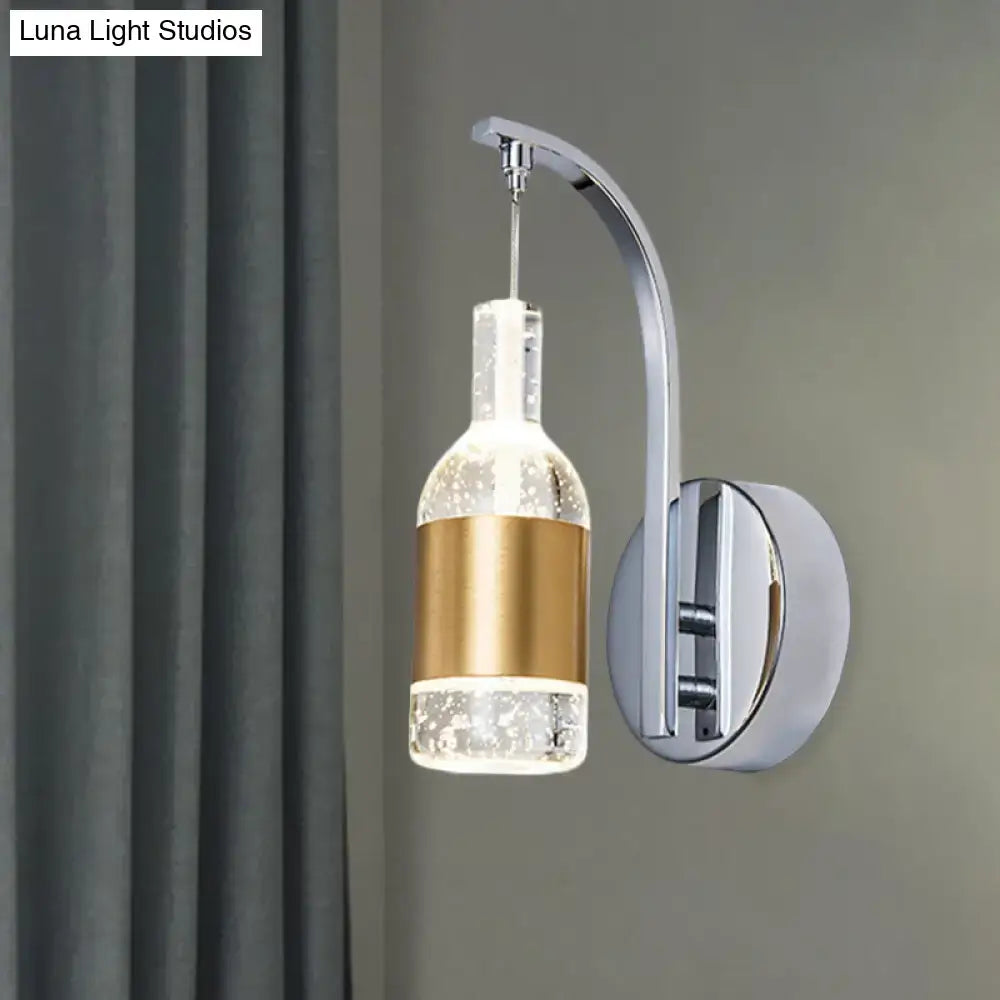 Modern chrome and gold seedy crystal wine bottle sconce with clear glass and metallic band for dining room lighting