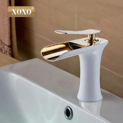 Modern gold and white copper waterfall vanity faucet with a sleek curved spout for bathroom decorbites copper waterfall design