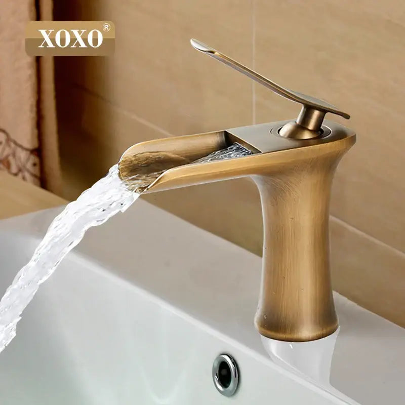 Antique brass xoxo brand copper waterfall vanity faucet with sleek modern design and flowing water spout by decorbites