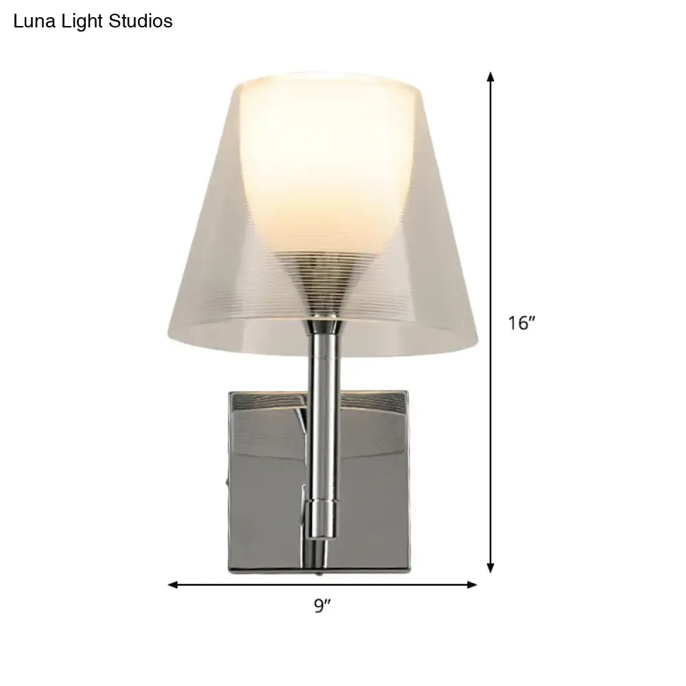 Modern chrome flared wall sconce with white glass frosted shade featuring subtle concentric ridges for living room light