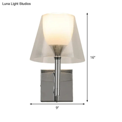 Modern chrome flared wall sconce with white glass frosted shade featuring subtle concentric ridges for living room light