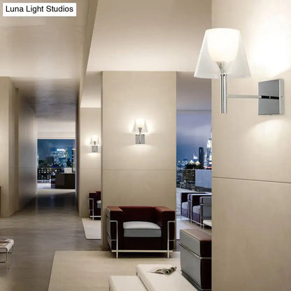 Modern chrome wall-mounted flared wall sconce with white glass shade for elegant living room lighting