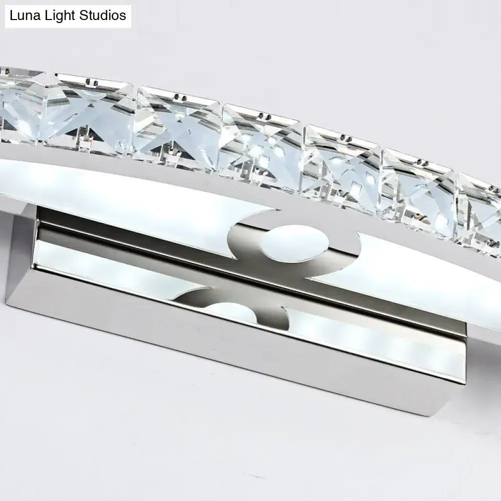 Modern chrome and wood led vanity light fixture with arched design and clear faceted crystal accents for bathroom use