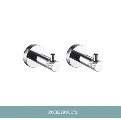 Pair of sleek chrome robe hooks with textured knurled ends in modern minimalist decorbites bathroom essentials set