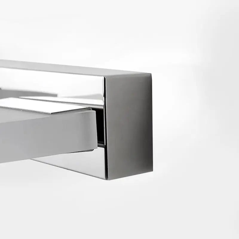 Modern chrome rectangular towel rack with clean minimalist design paired with acrylic shade and bulb included vanity light