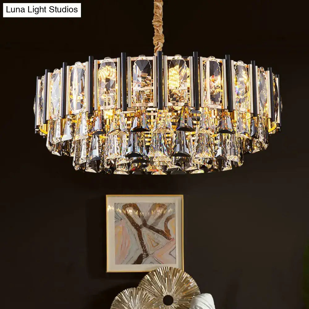 Gold-toned DecorBites™ chandelier with clear beveled crystal prisms and adjustable chain cord length for living rooms