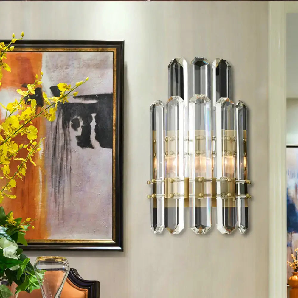 Modern chrome and black crystal wall sconce with faceted glass rods and gold accents direct wired electric power source