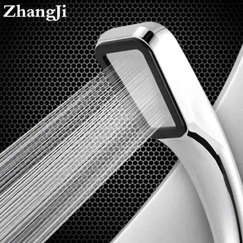 A sleek modern chrome and black rainfall shower head with a rectangular face handheld for bathroom use