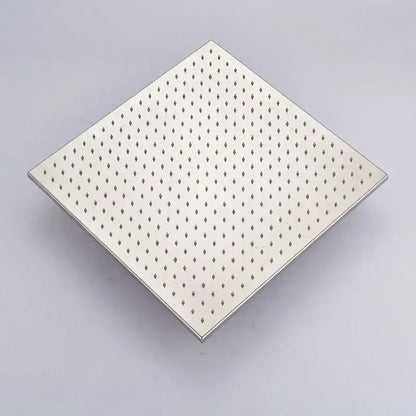 Square stainless steel drain grate with diamond perforations for modern chrome and brushed nickel rainfall shower head bathroom