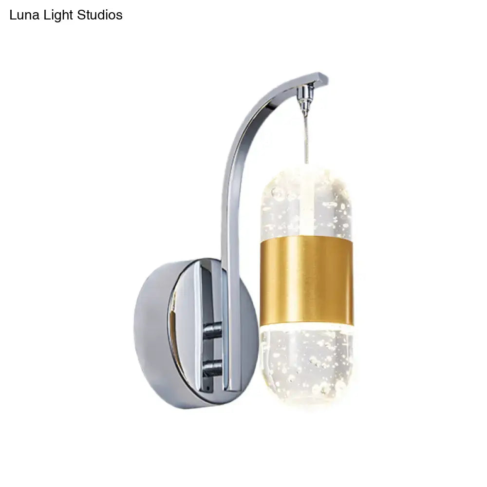 Modern chrome bubble crystal wall light with sleek chrome arm, circular base, and cylindrical glass shade with gold band