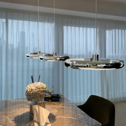 Modern chrome circular dining pendant led light with sleek elongated oval shapes for decorbites circular dining use