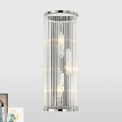 Modern chrome clear crystal shade wall light featuring cylindrical design with vertical glass rods and filament bulbs