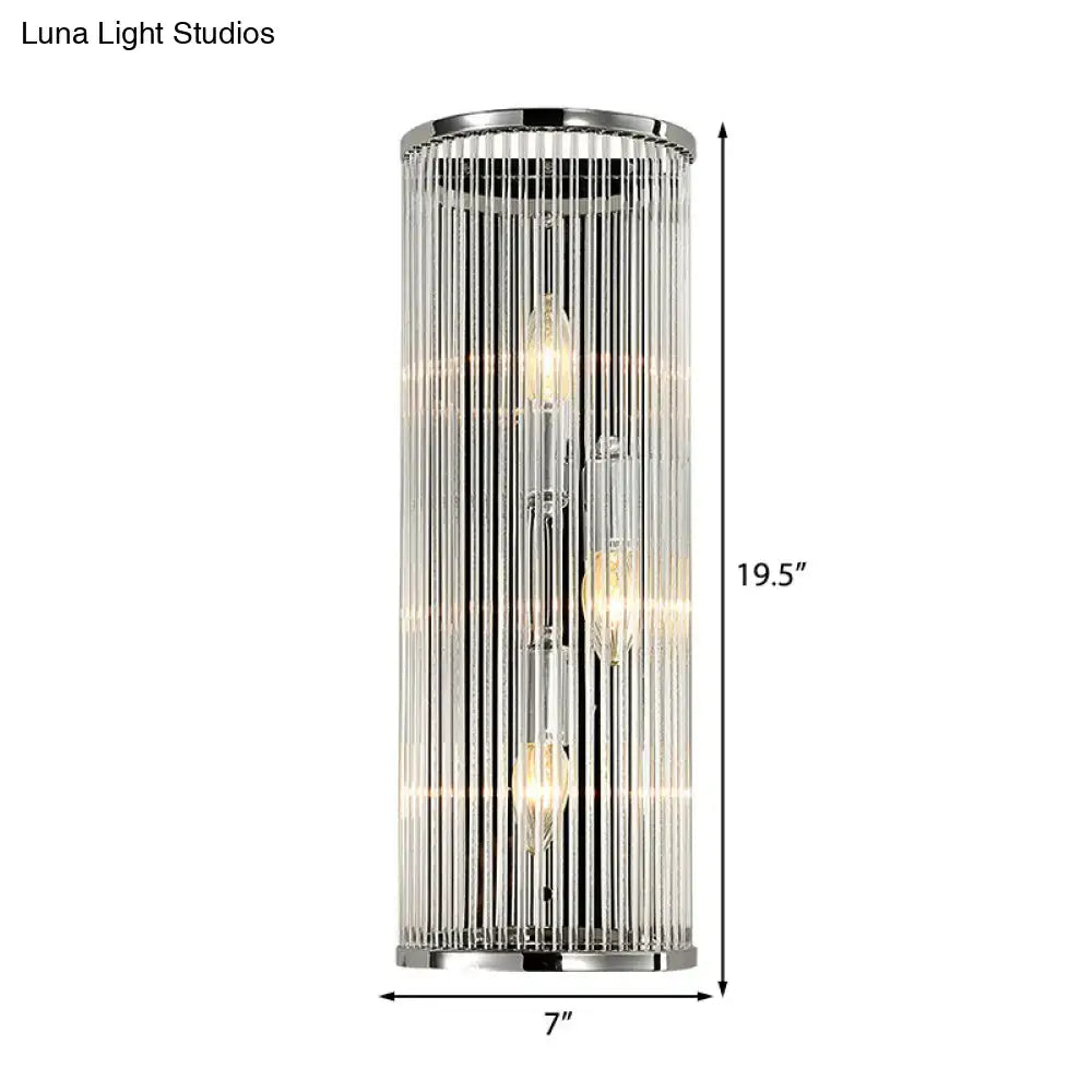 A sleek 19.5-inch modern chrome table lamp with clear crystal shade and warm incandescent bulbs for bedroom use