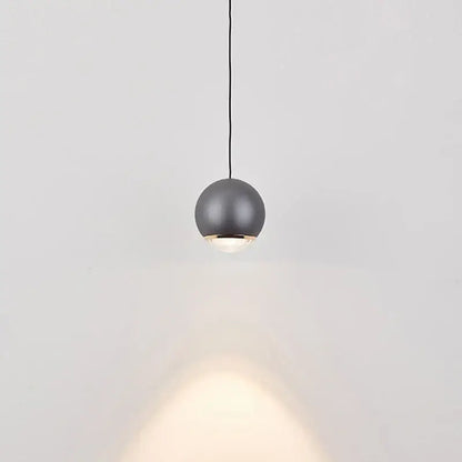 A sleek matte gray ball pendant light modern with warm glow for dining room chrome and copper led chandelier