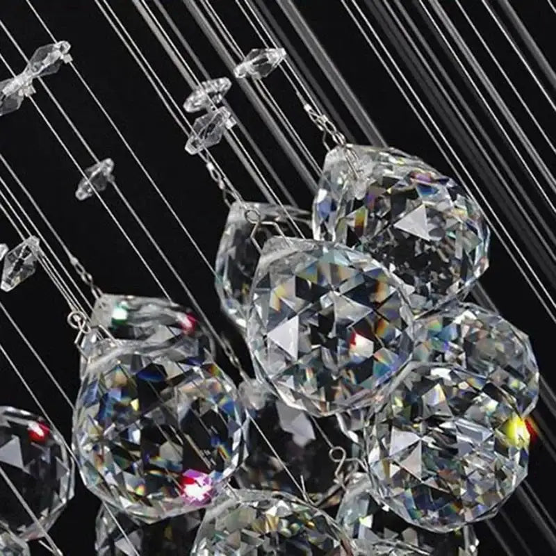 Modern chrome chandelier set featuring clear faceted decorbites crystal ball design spheres suspended by thin wires