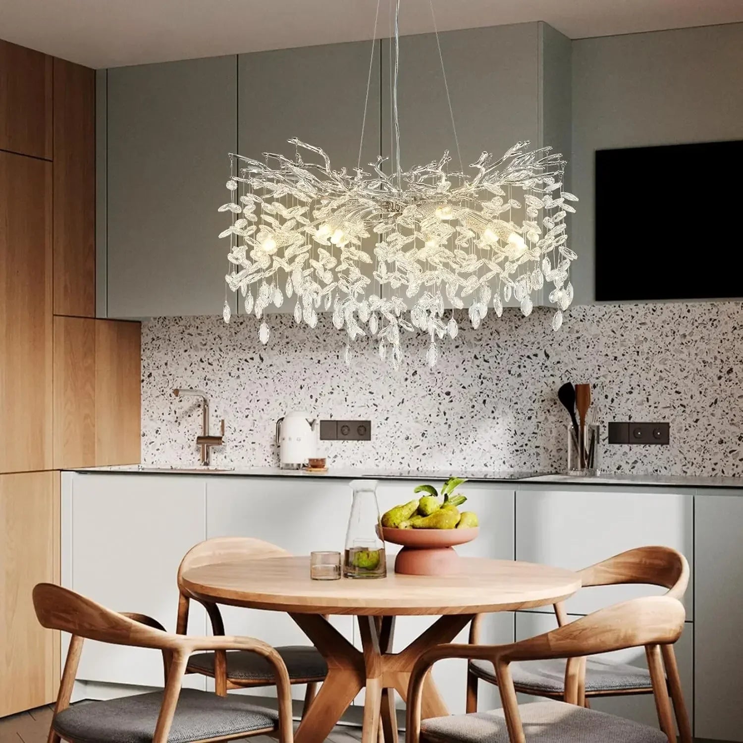 A modern chrome branch crystal chandelier with a delicate round design for living room bedroom ceiling fixture