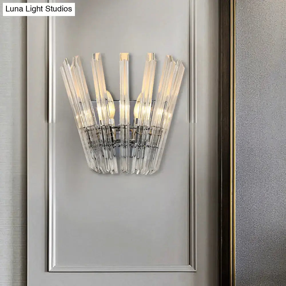 Modern chrome crystal fan wall mount light featuring clear faceted glass rods arranged radially around chrome mount light