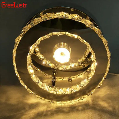 Modern chrome crystal led ceiling light featuring a shiny spiral chandelier with clear crystal accents and central illumination