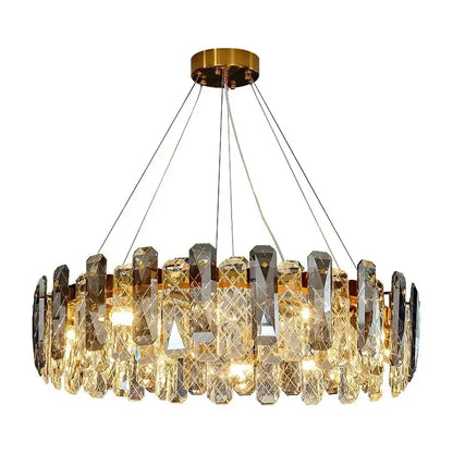 A modern chrome crystal led chandelier with gold-toned mount and faceted glass pieces by decorbites crystal led