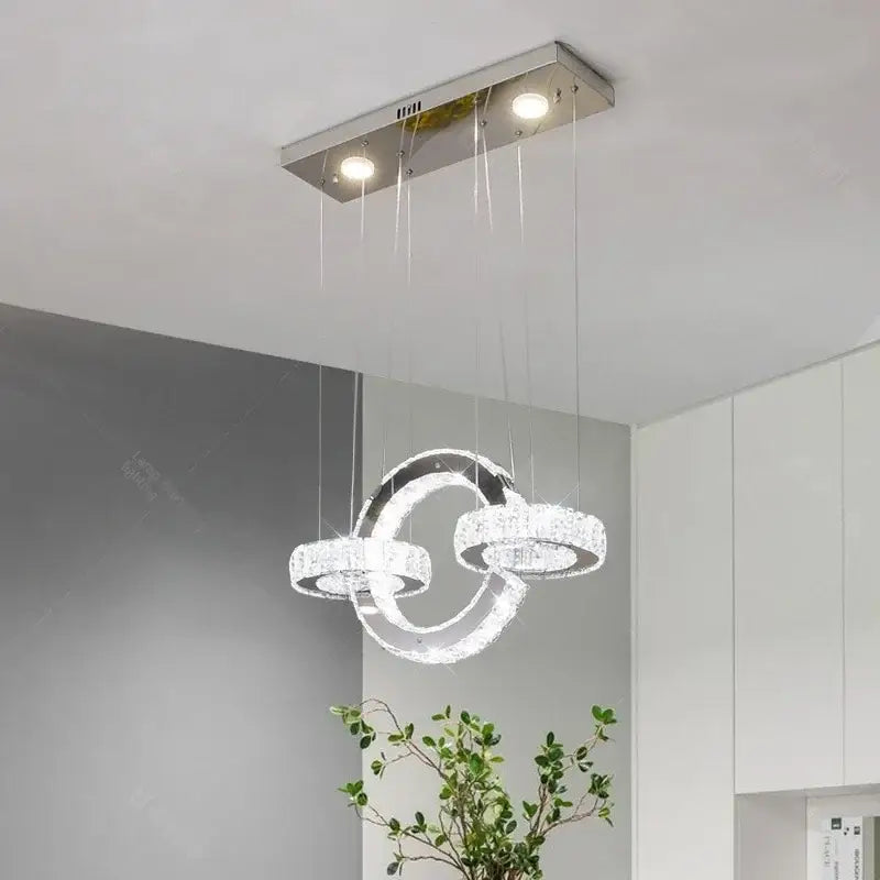 Modern chrome crystal led circle rings chandelier featuring three interlocking crystal led circle rings for bedroom decorbites decor