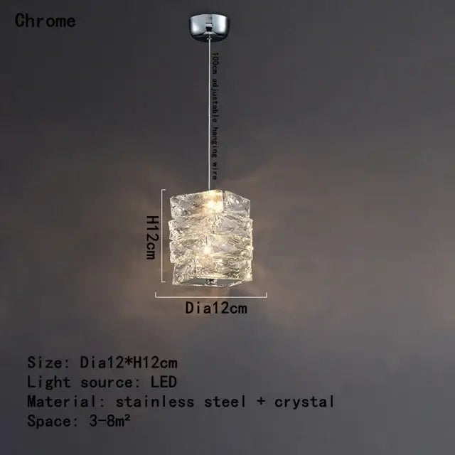 A modern chrome crystal led pendant with stacked clear glass crystals and an led bulb for dining room chandelier decorbites crystal led