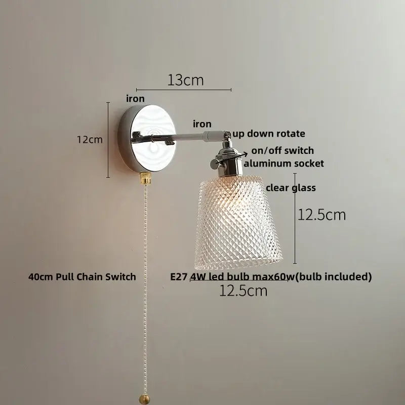 A sleek modern chrome crystal led wall light with an adjustable polished iron base and diamond-cut glass shade decorbites crystal led