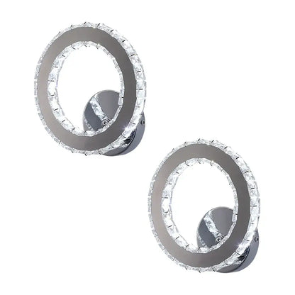 Modern chrome crystal led wall sconce with circular design and clear faceted crystal accents for living room decorbites crystal led