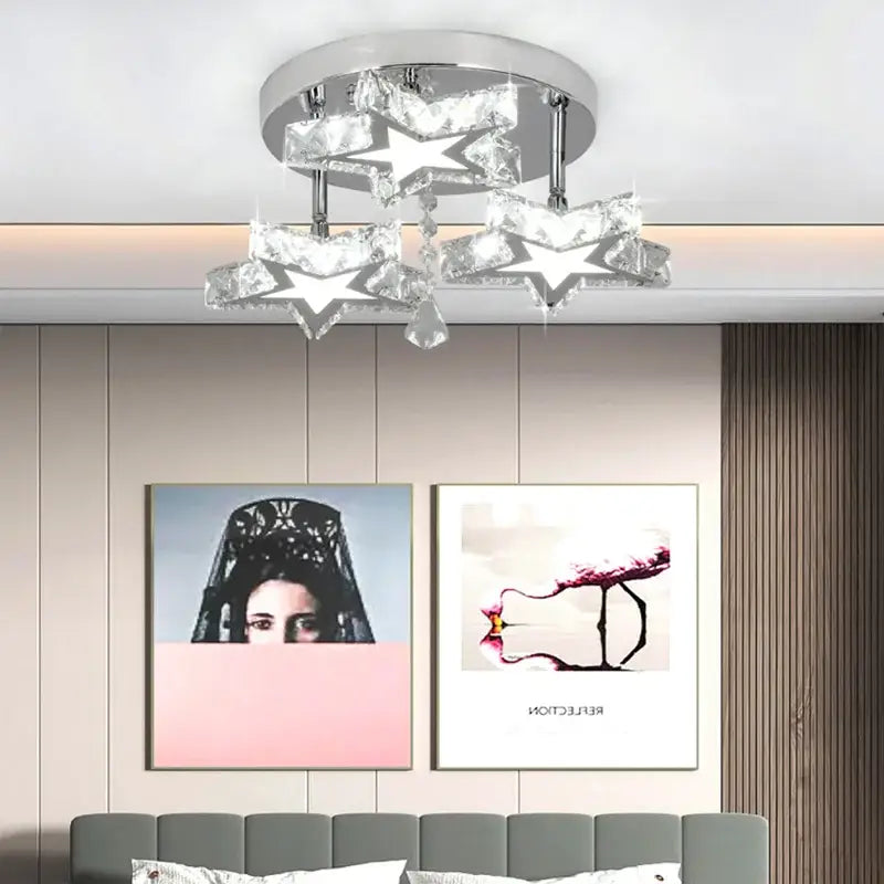 Modern chrome crystal nordic led ceiling chandelier with star-shaped design and dangling crystal accents for living room