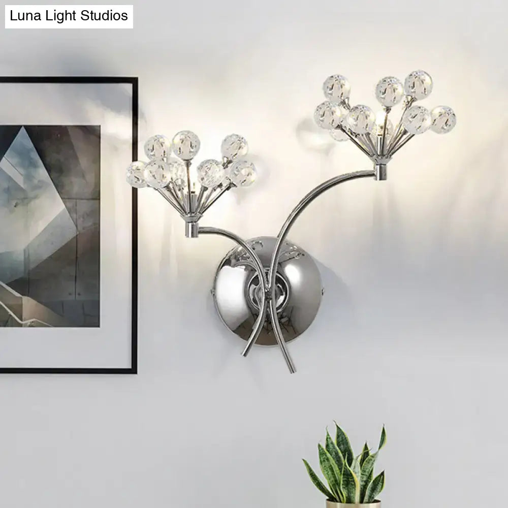Modern chrome crystal orb light fixture with two branching arms and clear globes direct wired electric wall sconce